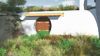 the cave house - in front of the door